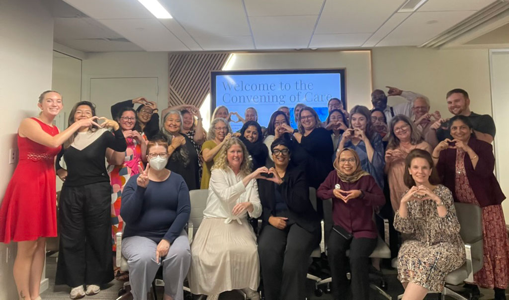 Participants from the Convening of Care conference gather for a group photo on Sept. 24, 2024, in Washington, DC.